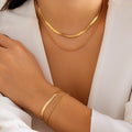 MÖBIU™ Set Parure Sinuosa – Collana e Bracciale a Serpente in Acciaio Placcato Oro