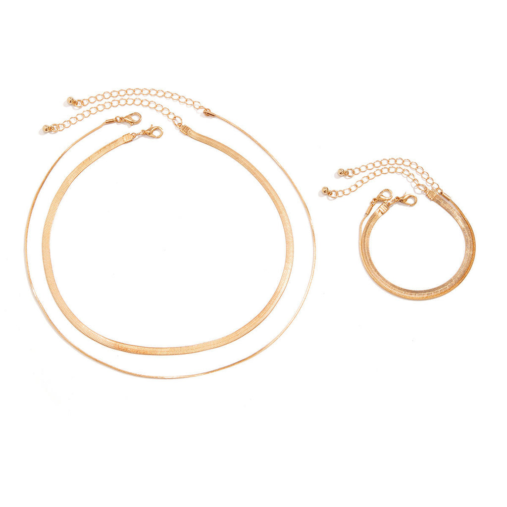 MÖBIU™ Set Parure Sinuosa – Collana e Bracciale a Serpente in Acciaio Placcato Oro